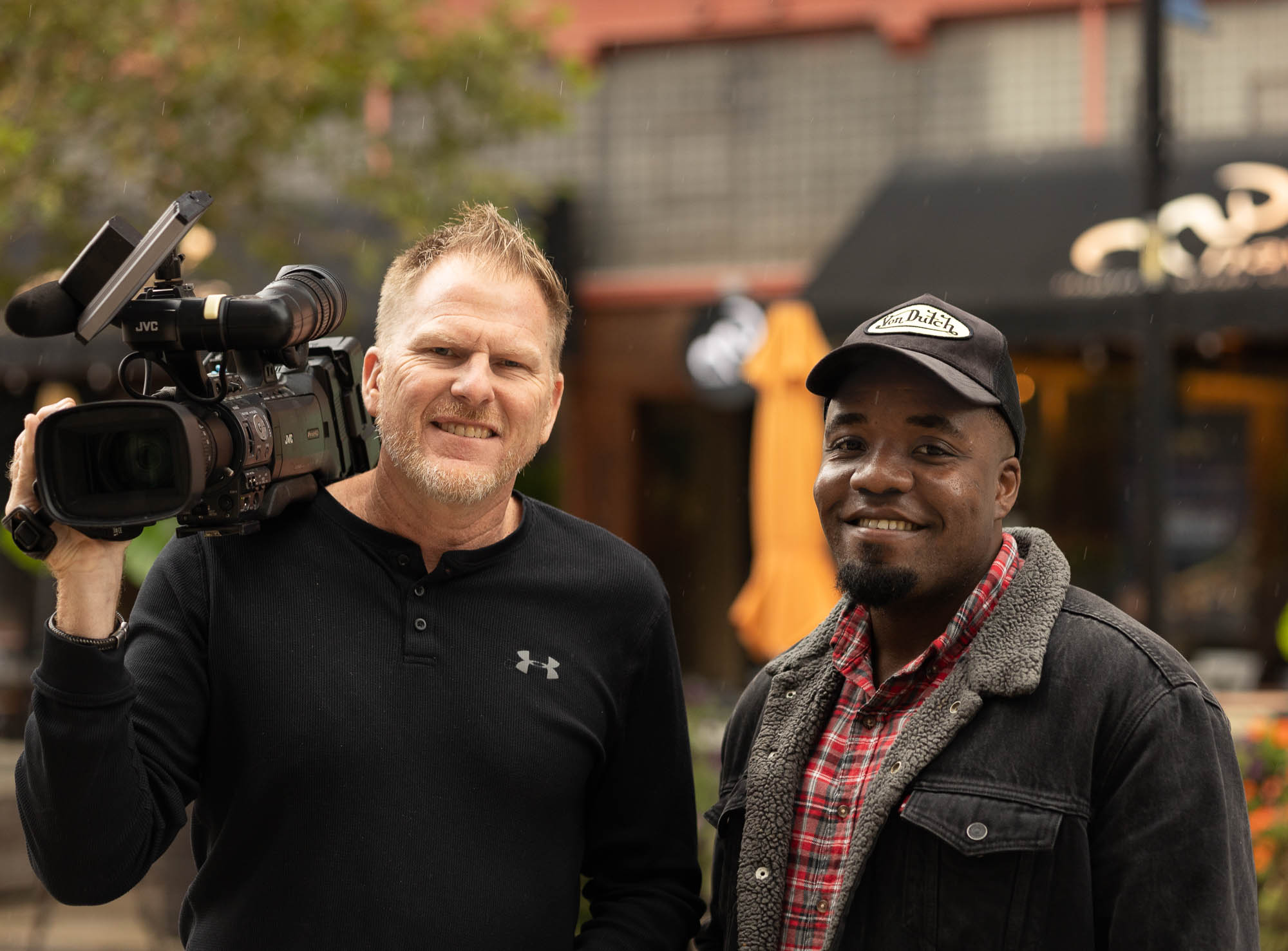 Victor Inwang and 21Alive cameraman with broadcast camera at The Landing