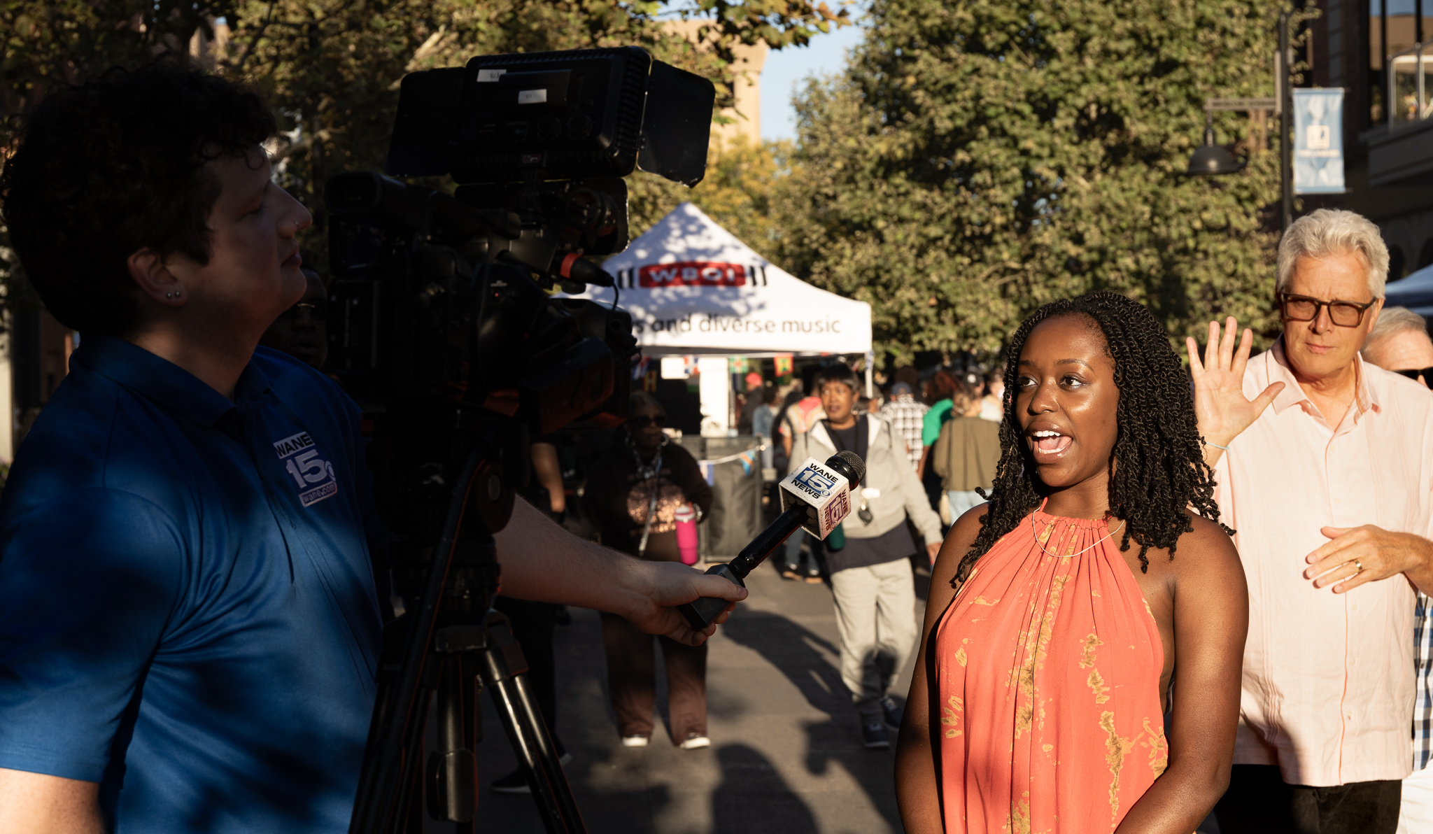 WANE 15 news interviewing attendee live on The Landing