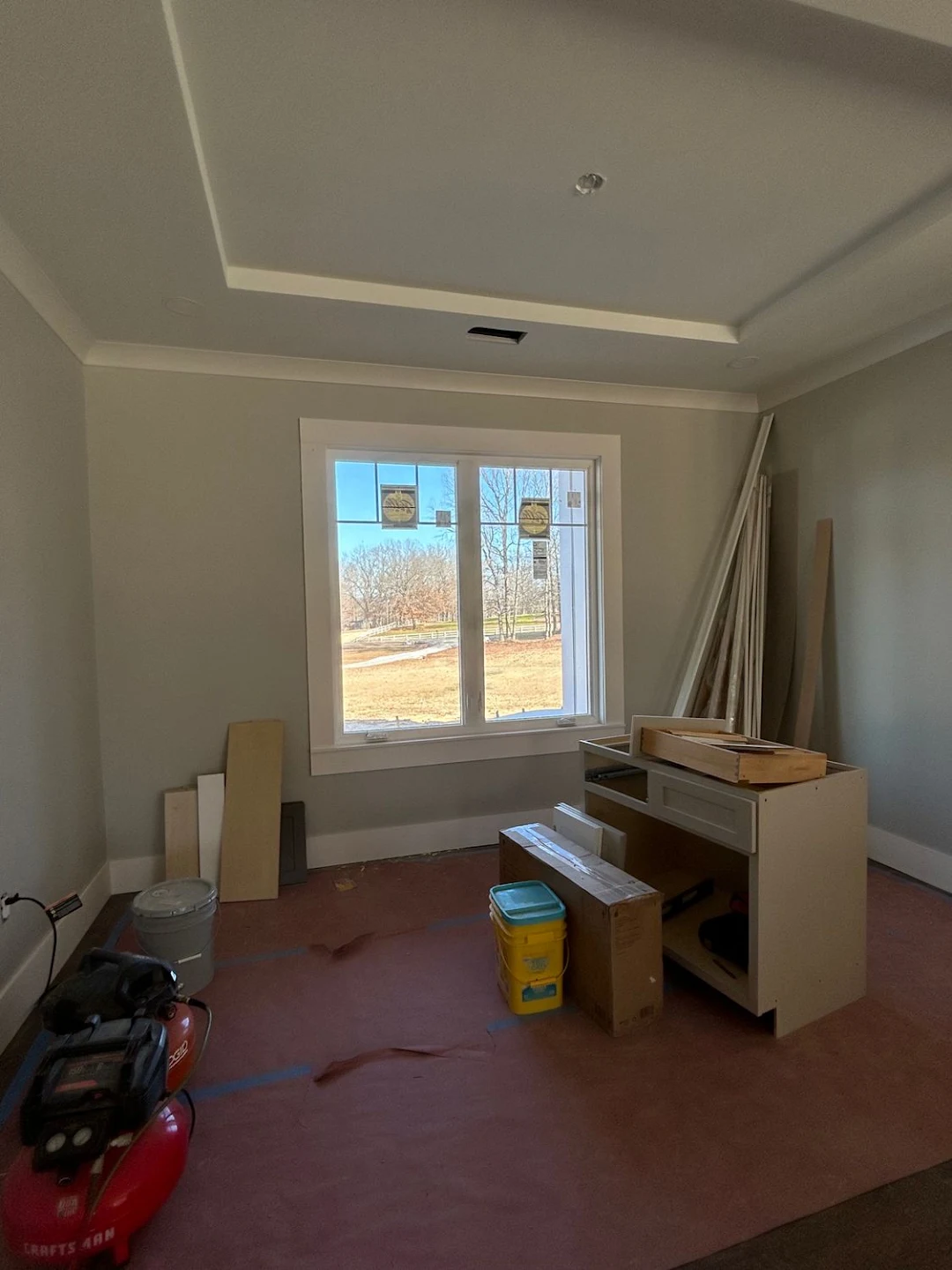 Recessed tray ceiling trim and window casing finish carpentry