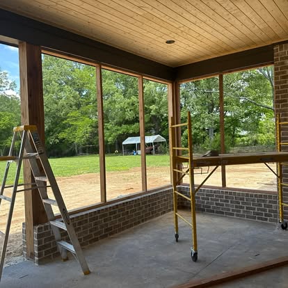 Custom timber frame screened porch structure and open-air deck construction