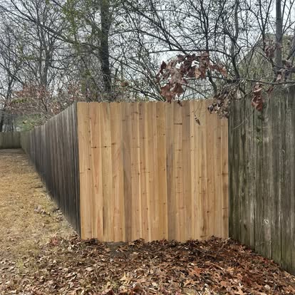 New cedar wood privacy fence installation in Bartlett backyard