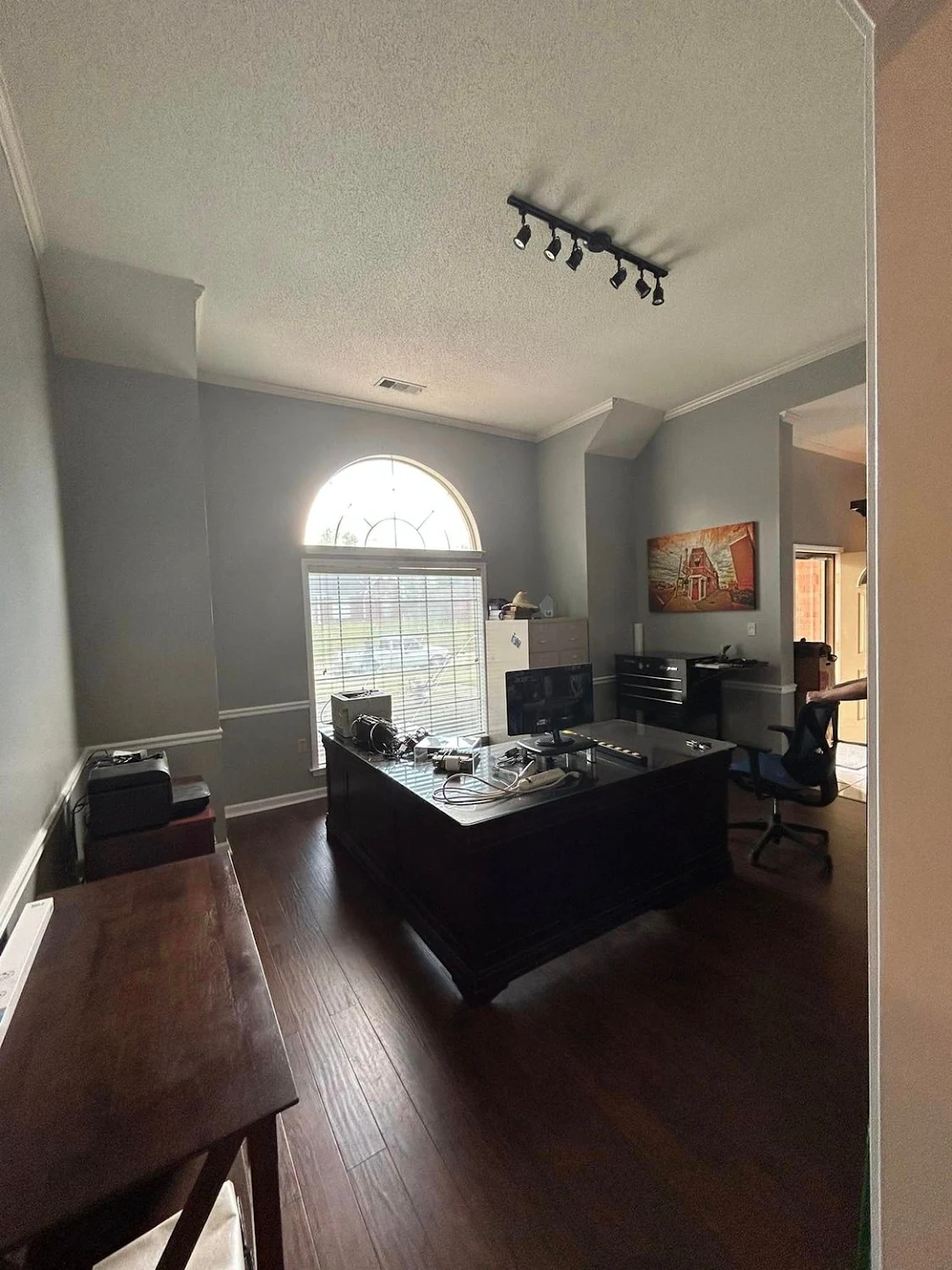 Executive commercial office chair rail, crown molding, and window arch casing