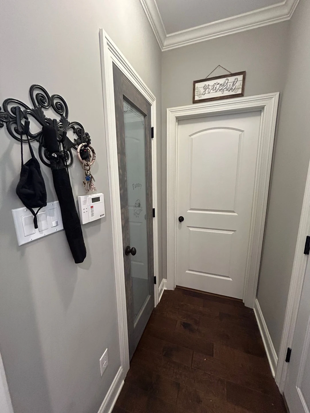 Craftsman hallway door casing, crown molding, and baseboard trim installation