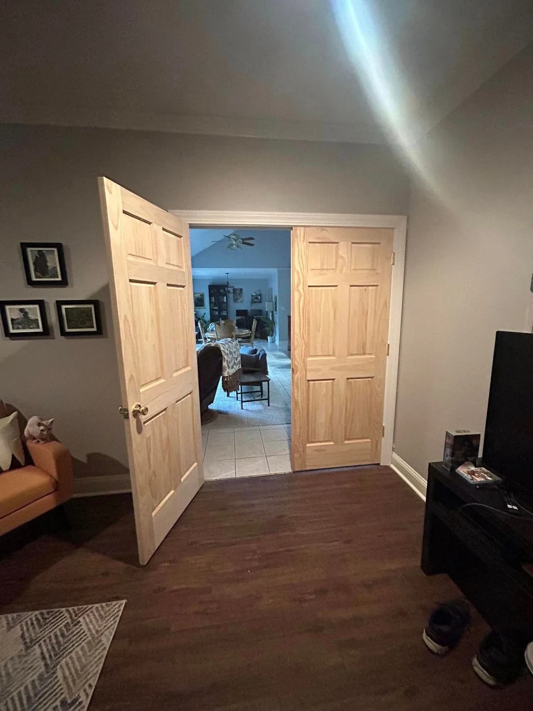 Solid wood double French interior doors installation with custom casing
