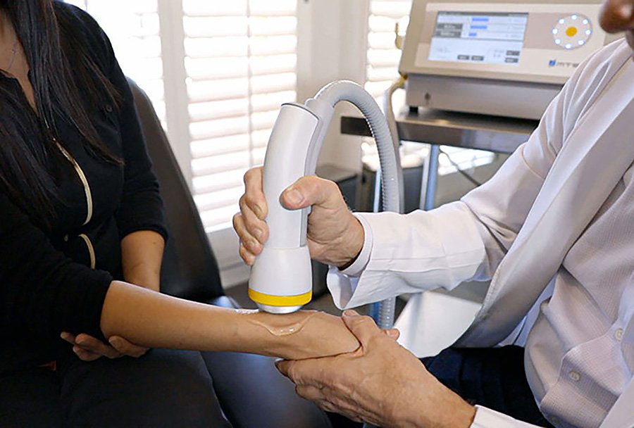 SoftWave therapy for knee pain at our Lake Nona chiropractic office