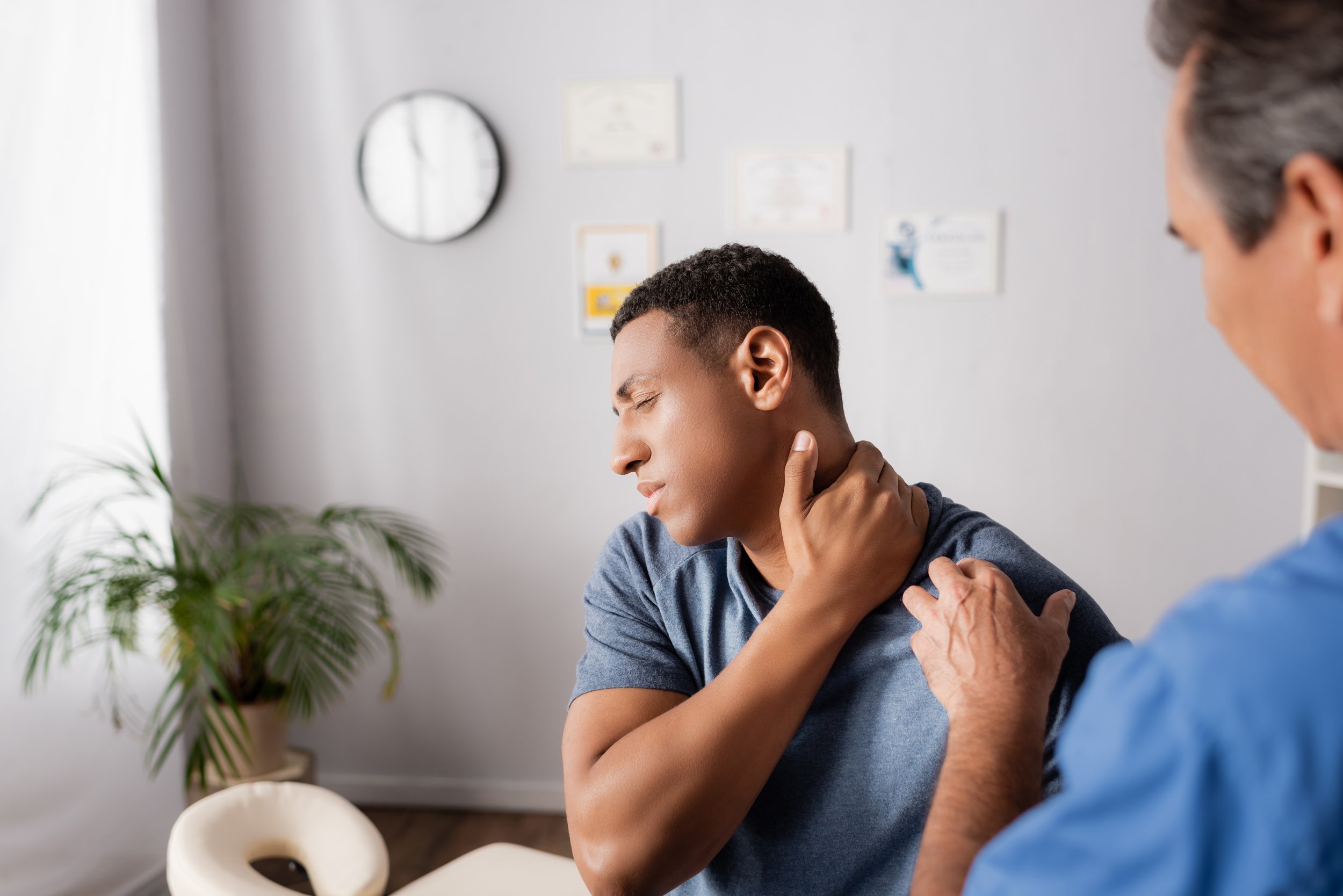 Neck examination to identify headache source at Lake Nona Chiropractic