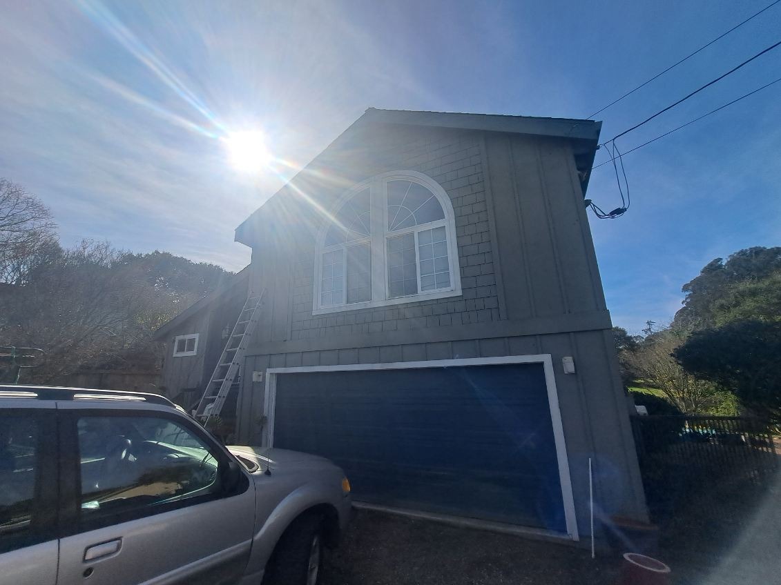 Coastal Home Transformation - Exterior Painting project by Rainbow Painting Inc.