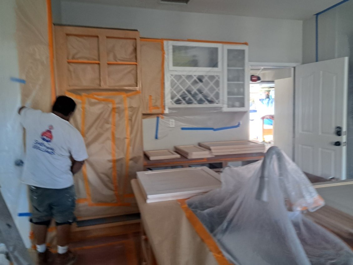 Interior Cabinet Refinishing - Cabinet Refinishing project by Rainbow Painting Inc.