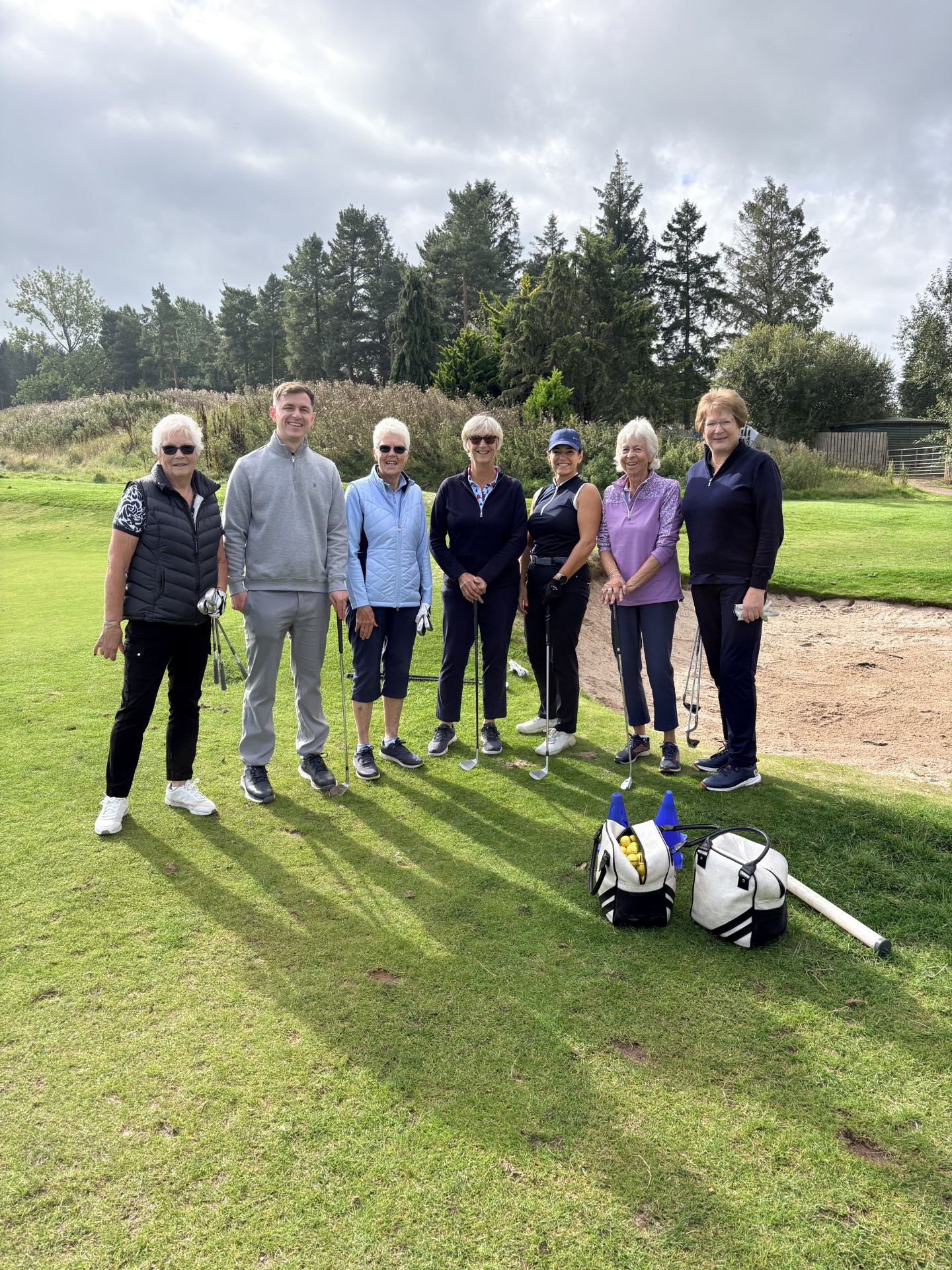Paddy McKenna with a group coaching clinic on the green