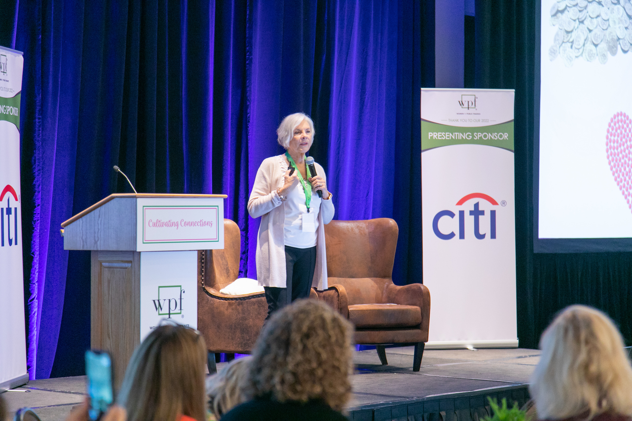 Christine Whitney Sanchez speaking on stage