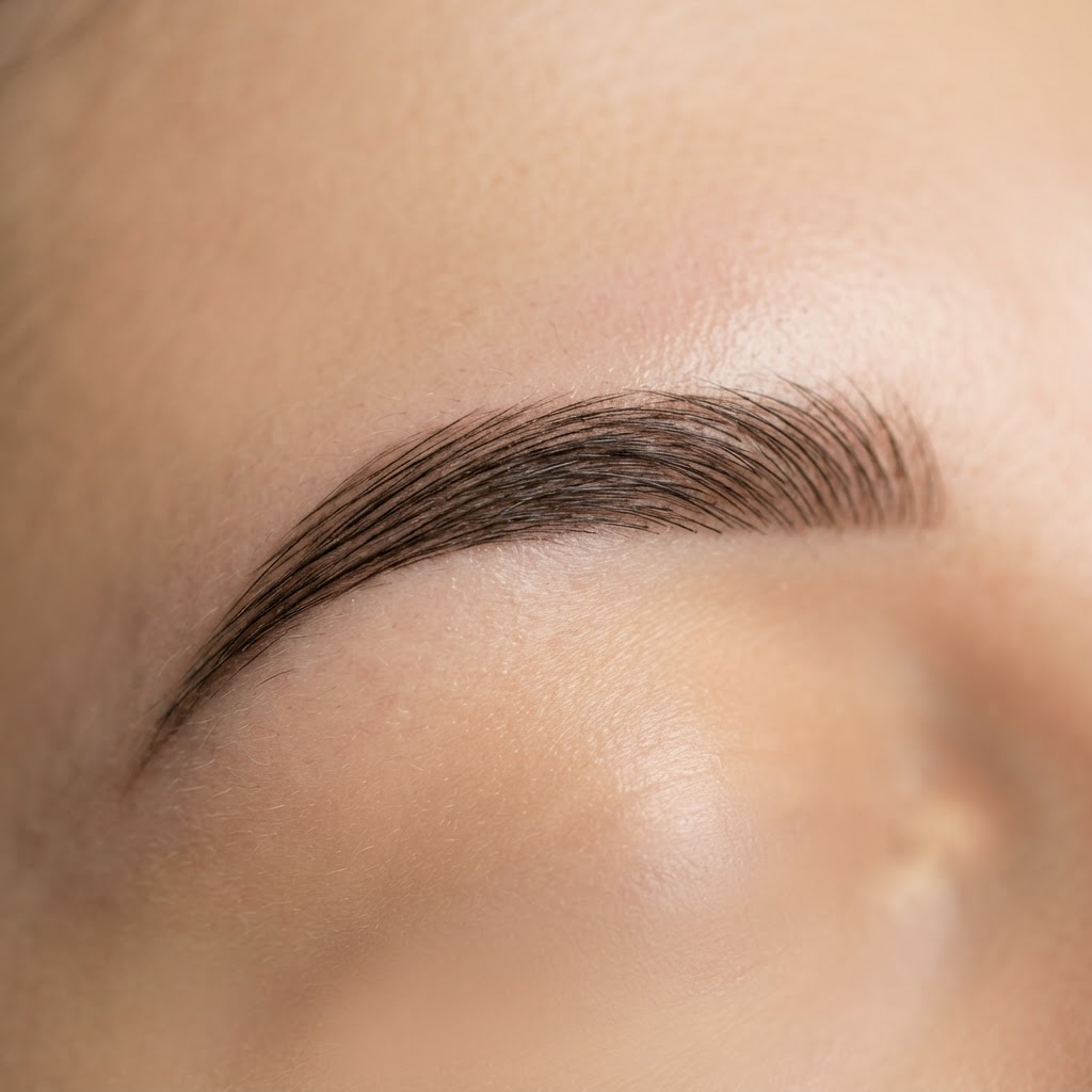 Precision microblading hair strokes by Tari.