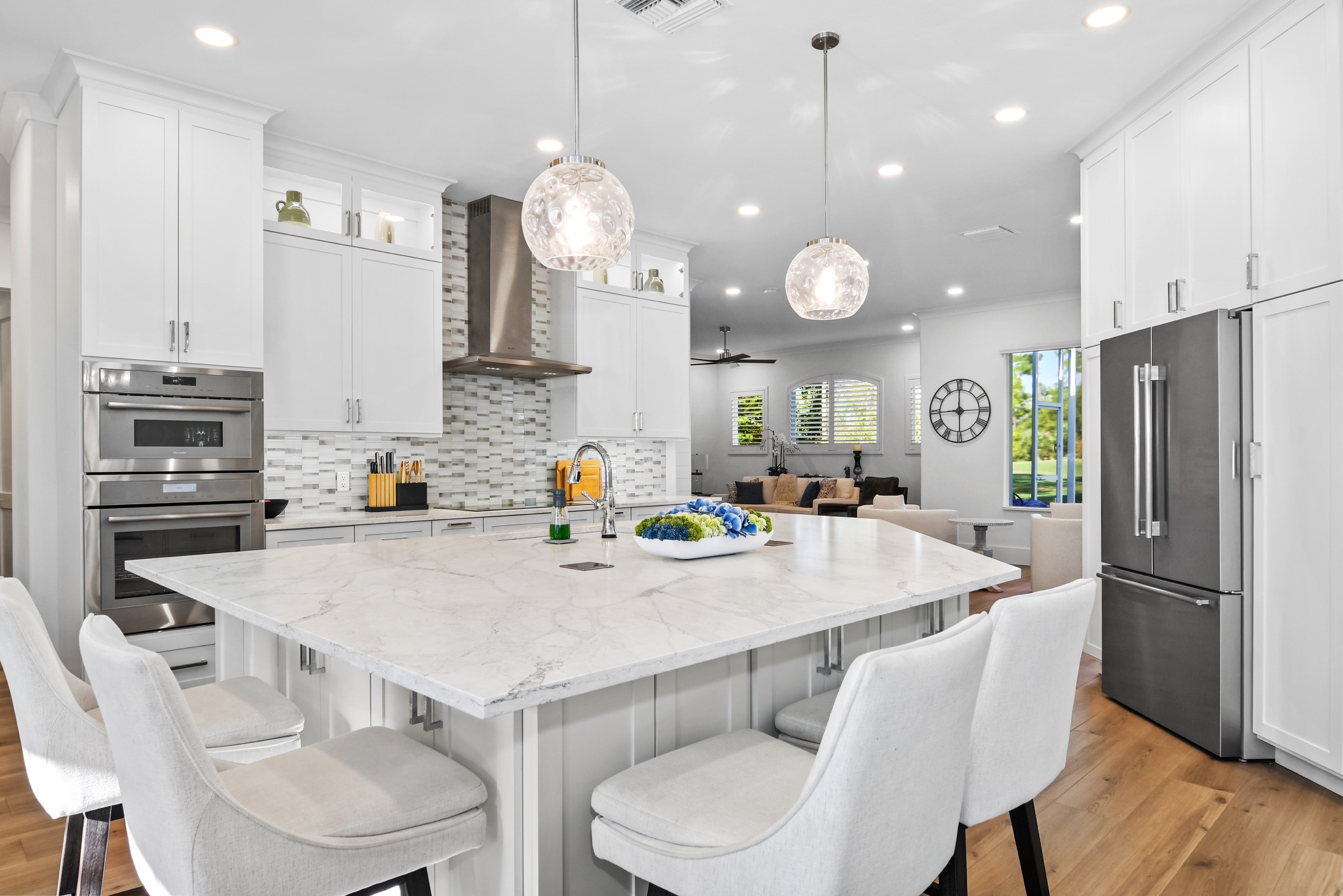 White Kitchen — Marble Island & Globe Pendants