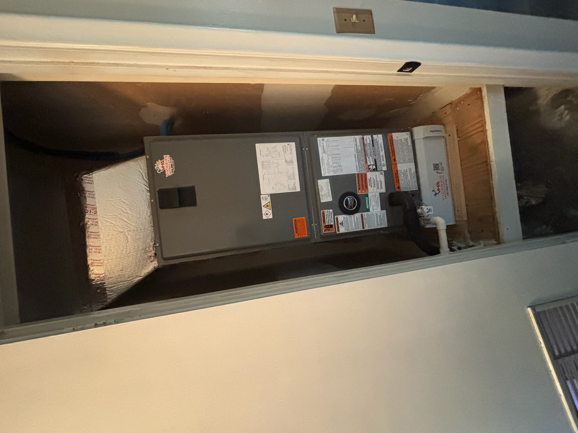New Ruud indoor air handler installed in the closet in Williston, FL