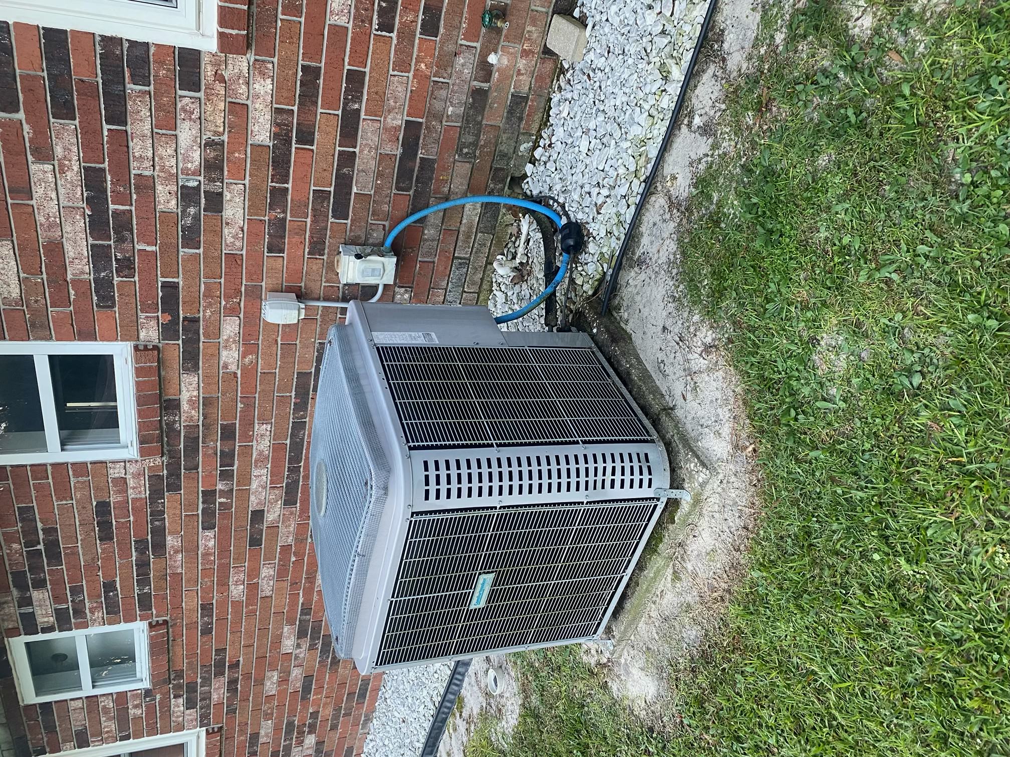 Old outdoor unit before a 3 ton heat pump replacement in Williston, FL