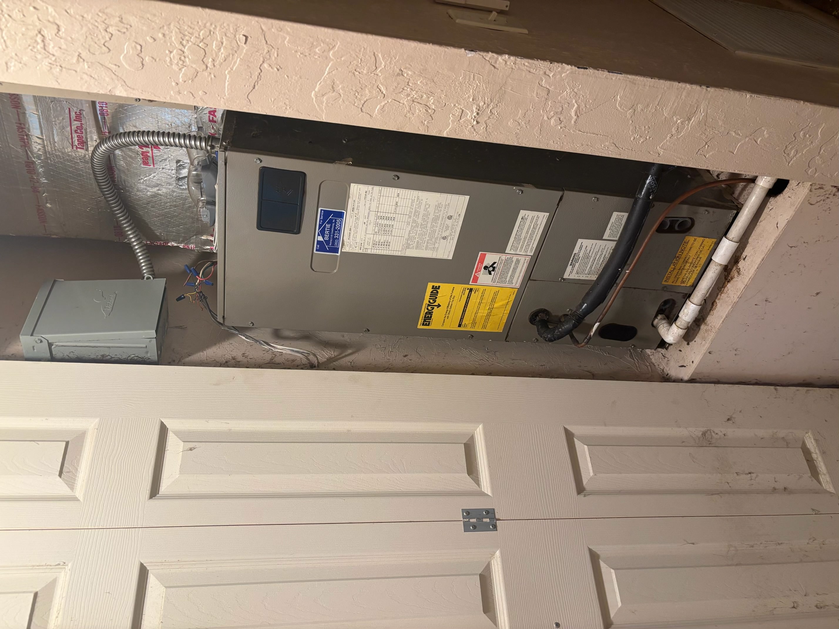 Old indoor air handler before replacement in Gainesville, FL