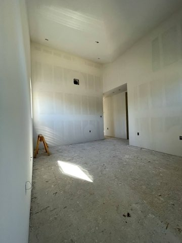 Interior drywall preparation work in progress