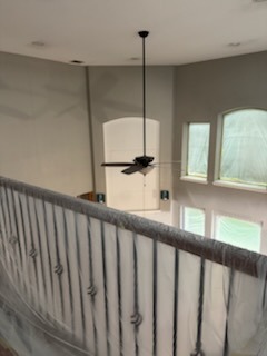 Interior room with freshly painted walls and white trim by Paint And Remodeling Aguilar