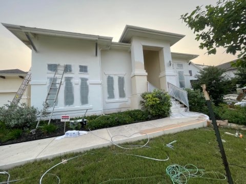 Home exterior being painted by Paint And Remodeling Aguilar