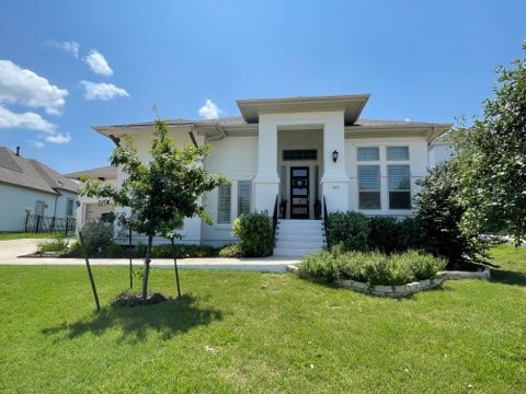 Beautiful white modern farmhouse exterior painted by Paint And Remodeling Aguilar LLC