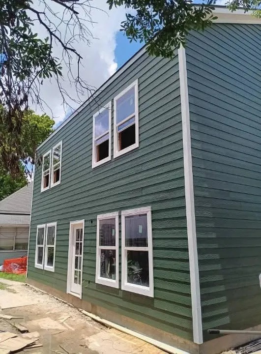 Green siding exterior house painting Mesa Arizona