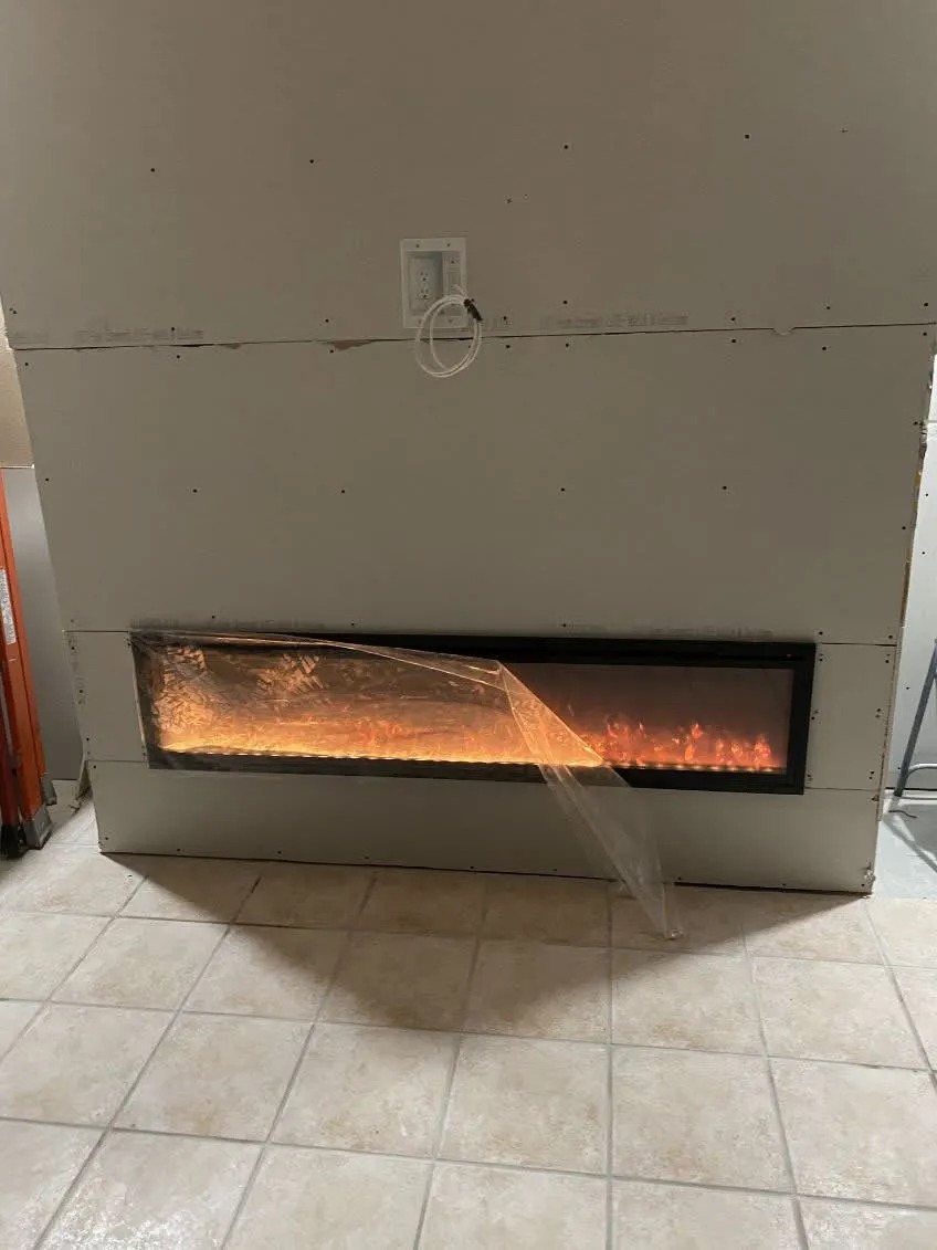 Electric Fireplace Rough-In Installation in New Home Drywall Wall — Roseville