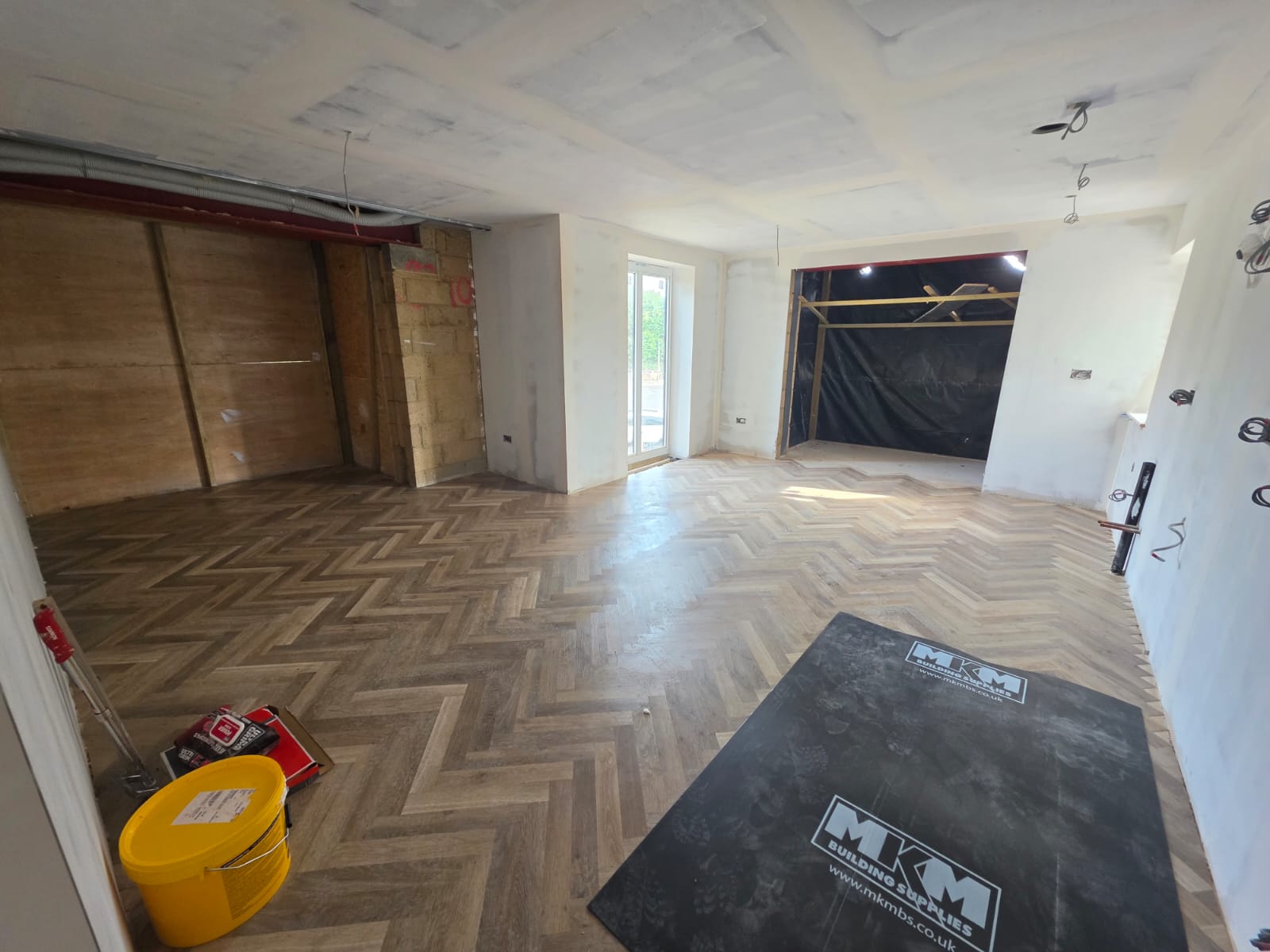 Subfloor preparation and underfloor heating insulation board fitting in Southend-on-Sea residential refurbishment by DWELLUX