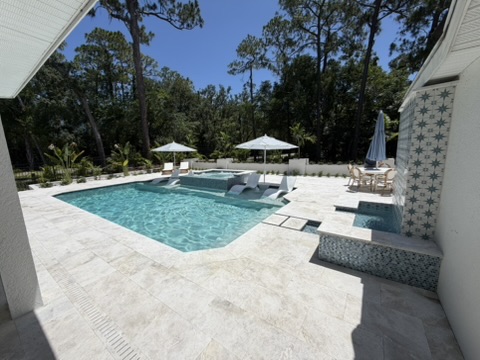 Geometric Pool Remodel with Raised Spa & Baja Shelf — Oldsmar, FL