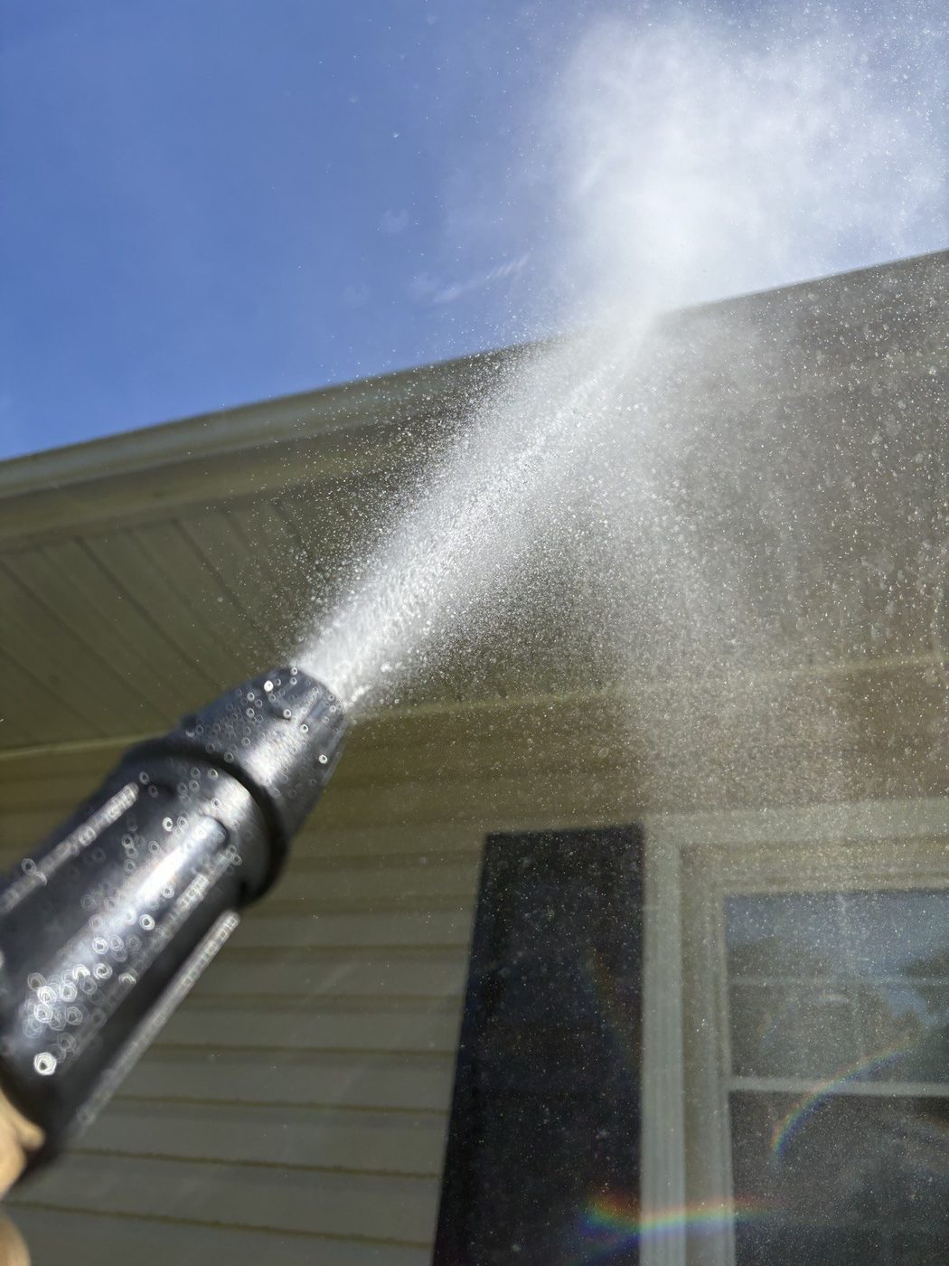 TrueClean pressure washing an exterior surface in Greensboro