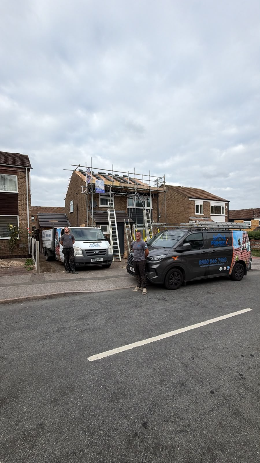 Primefix Roofcare team and vans outside residential property during complete re-roof