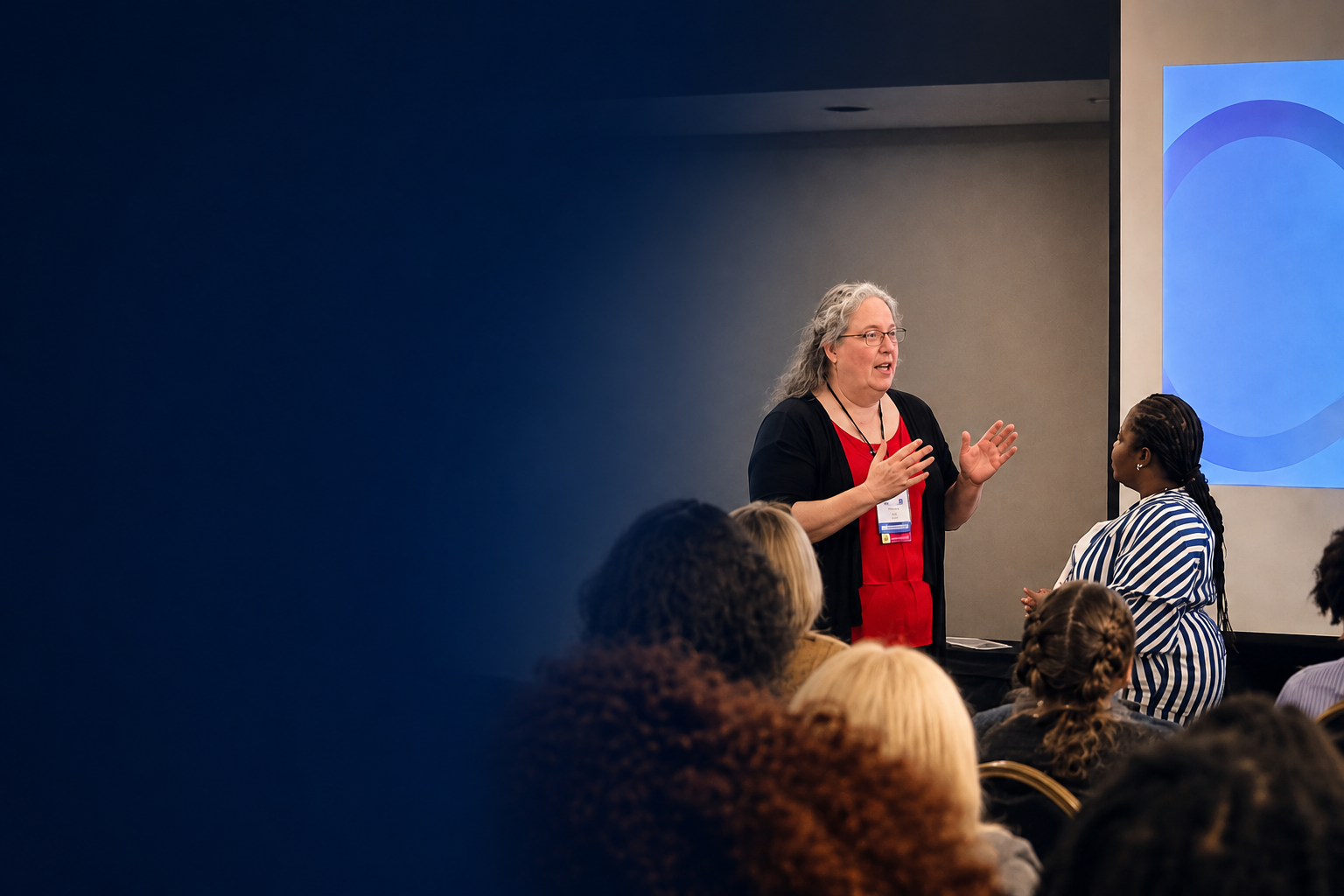 Inspiring woman speaker engaging with an audience