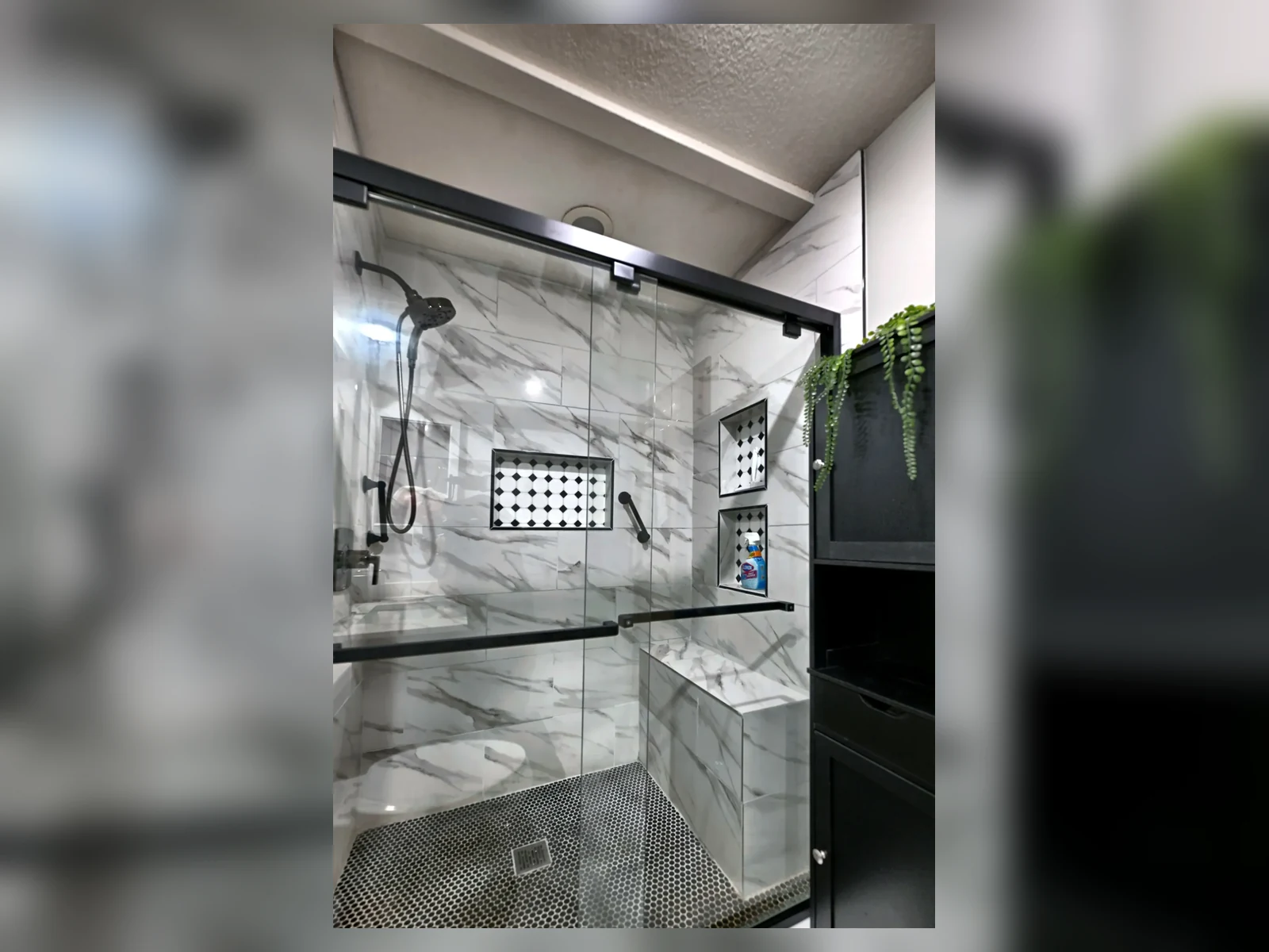 Remodeled bathroom shower with tile surround by ARC Builds KC