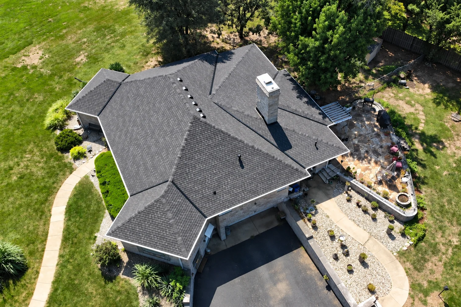 Aerial view of a completed roof replacement project by ARC Builds KC