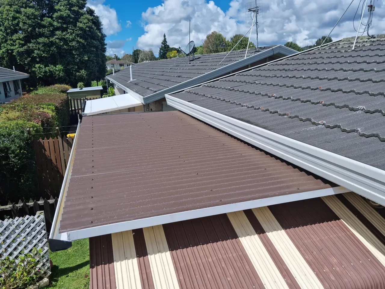 Roofing - Complete re-roof, including spouting and down pipes.