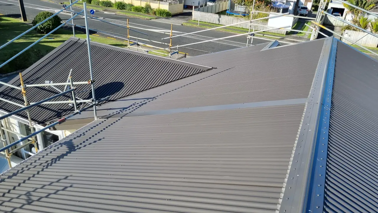 Roofing - Completed flashing sealed at junctions and penetrations.