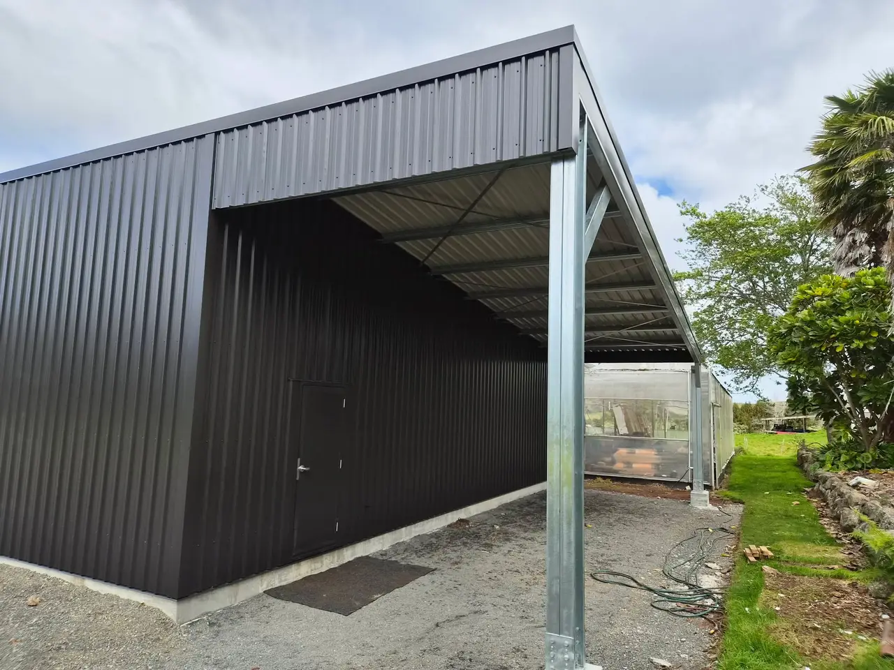 Steel Portal Workshop Shed - Side view of open portal.