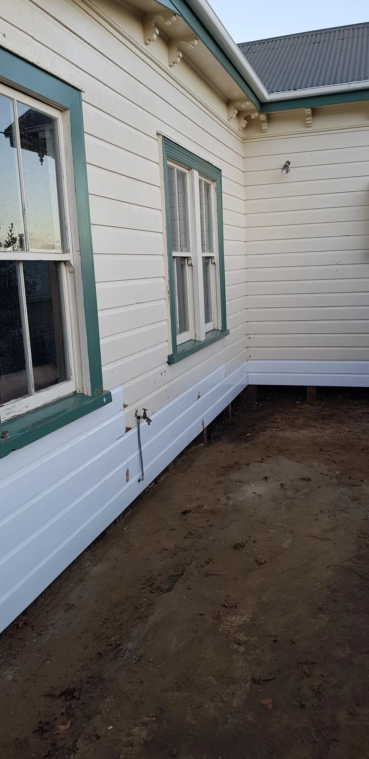 General Maintenance - Weatherboards installed ready for paint and landscaping.