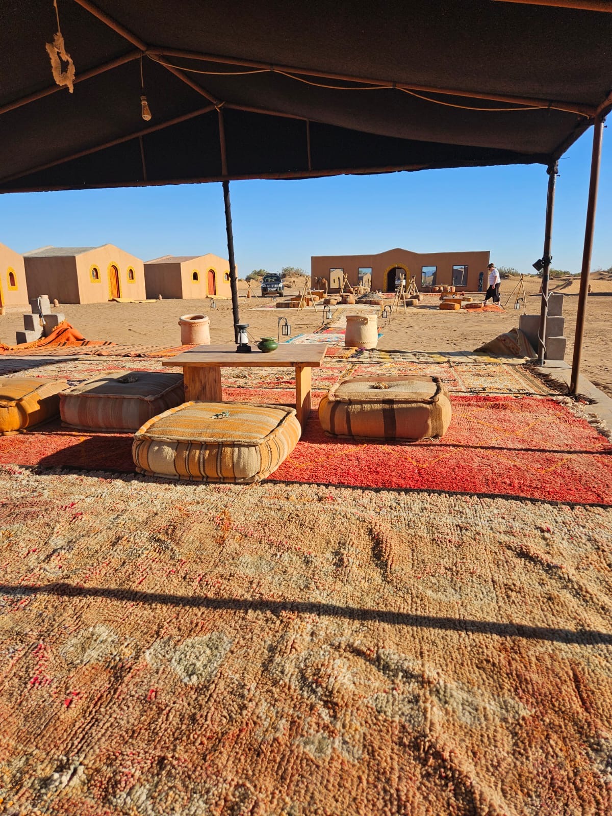Authentic Moroccan desert camp with carpets and cushions
