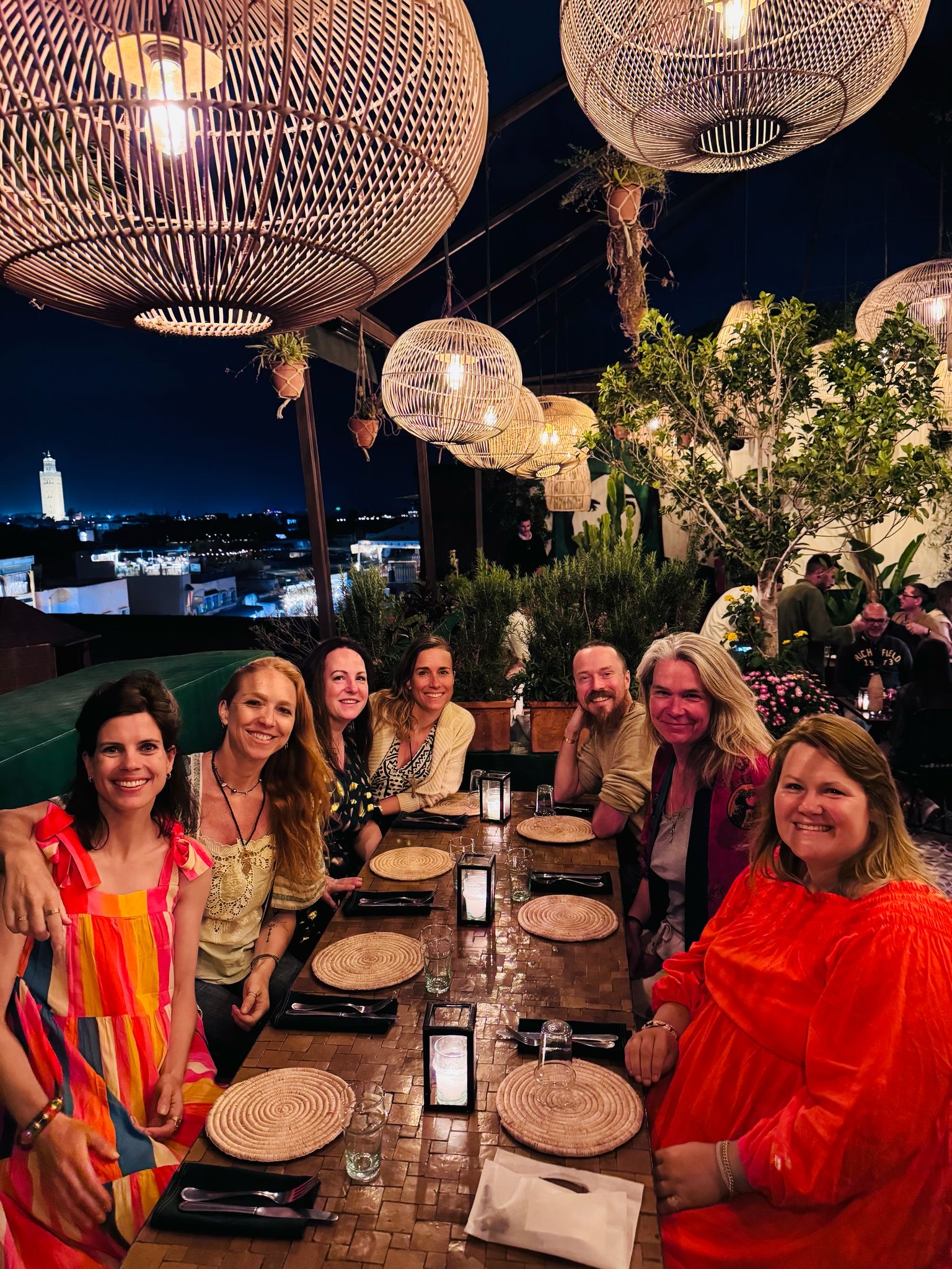 Women gathered for rooftop dinner in Marrakech