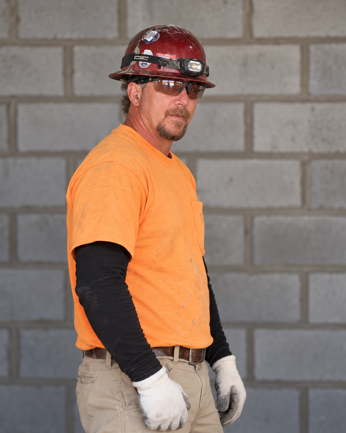 Louis Masonry heavy structural masonry craftsman in full PPE