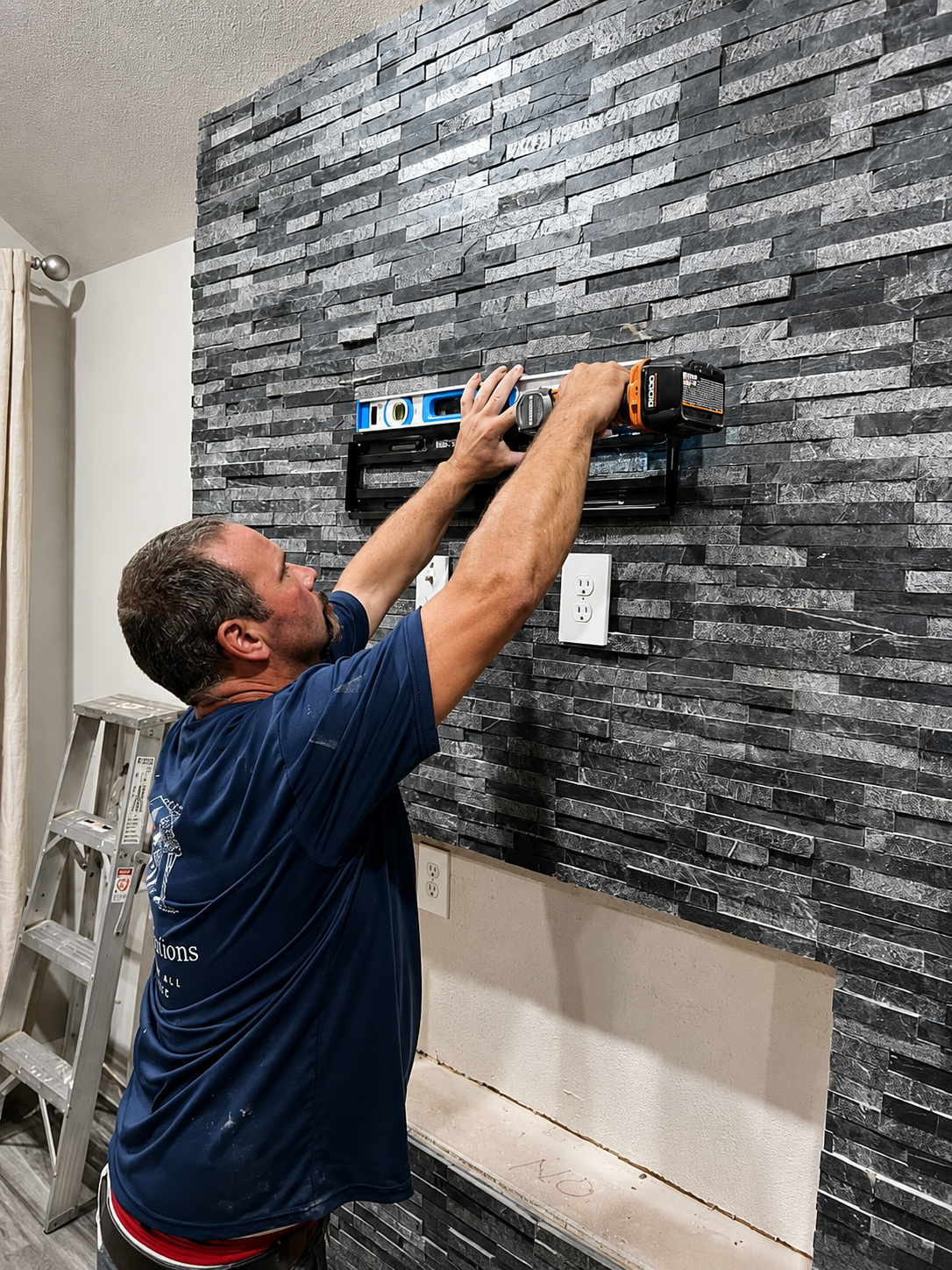 Glenn leveling custom stone feature wall craftsmanship