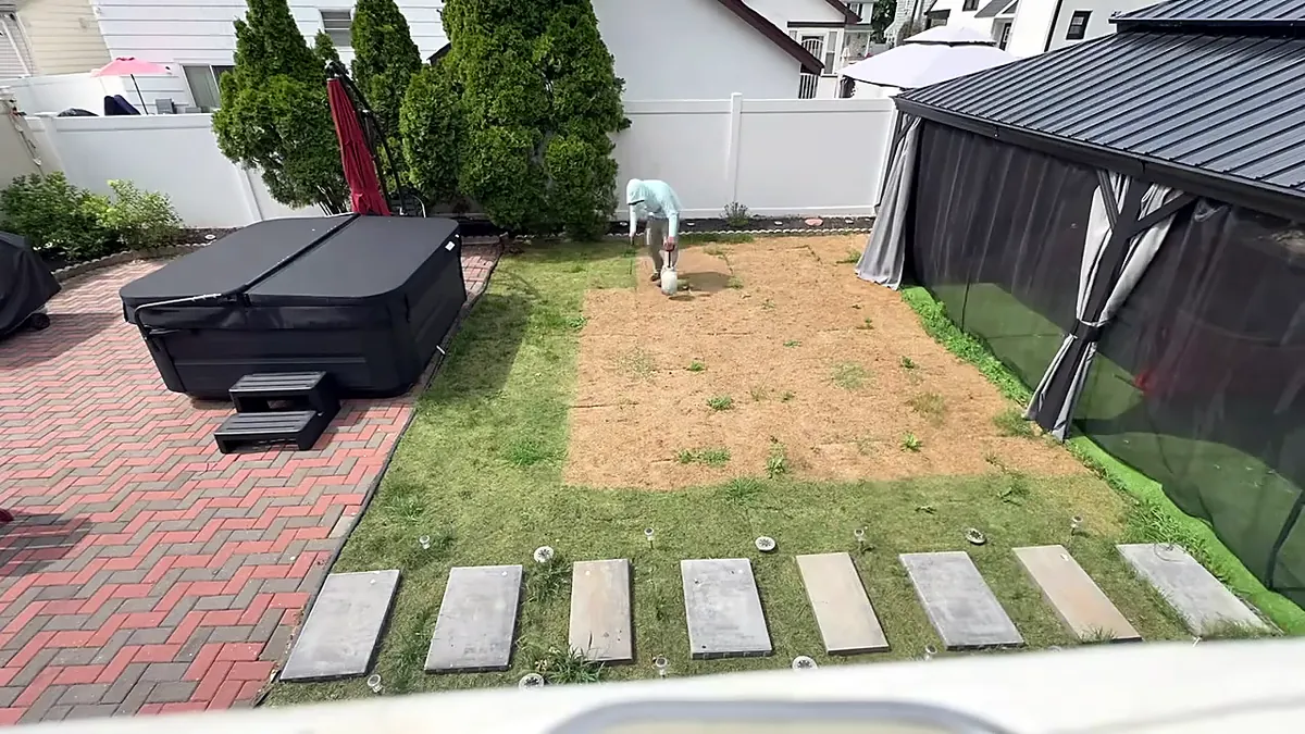 backyard lawn and pavers before restoration North NJ