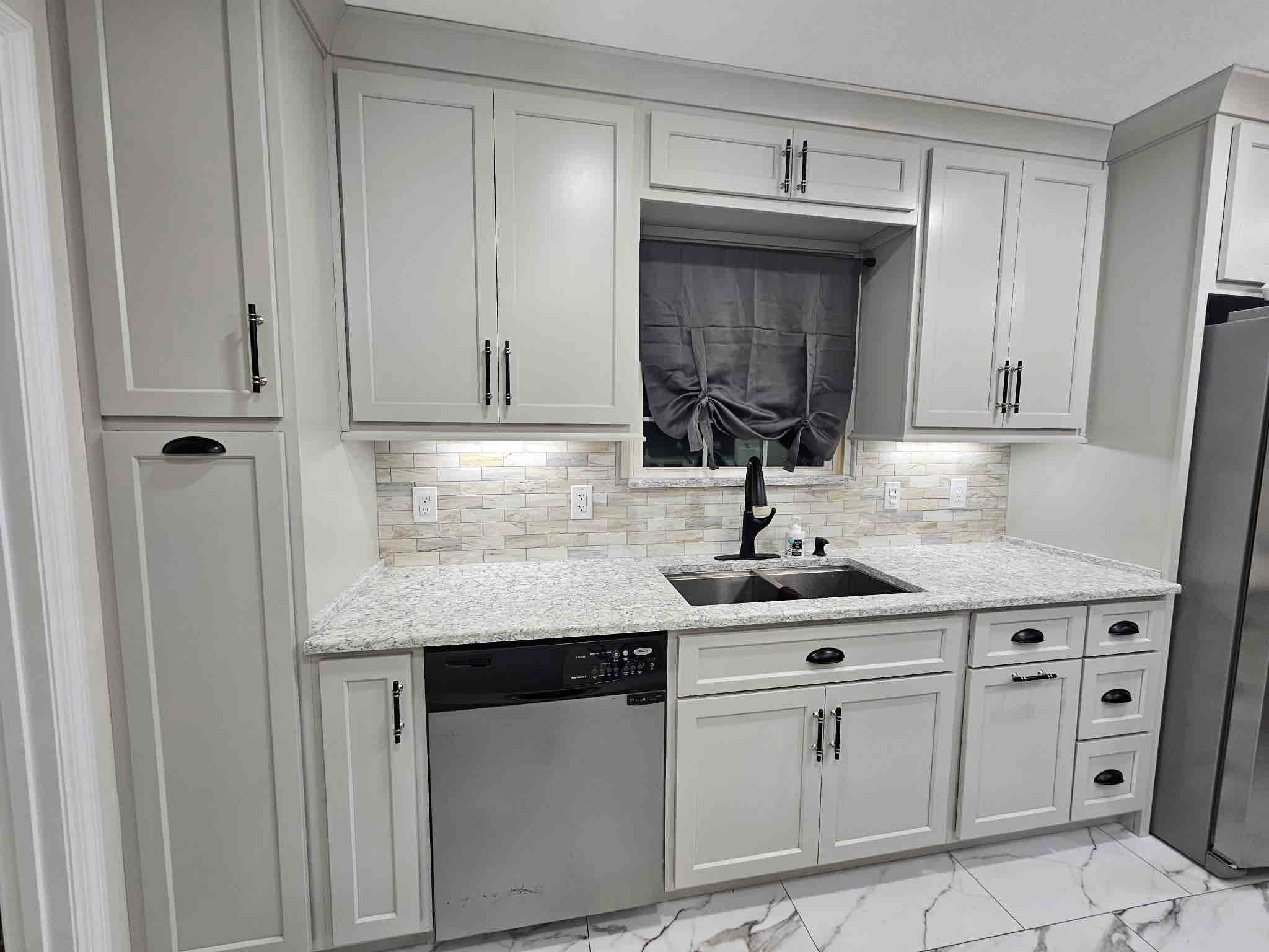 GFCI outlets and under-cabinet lighting near a kitchen sink