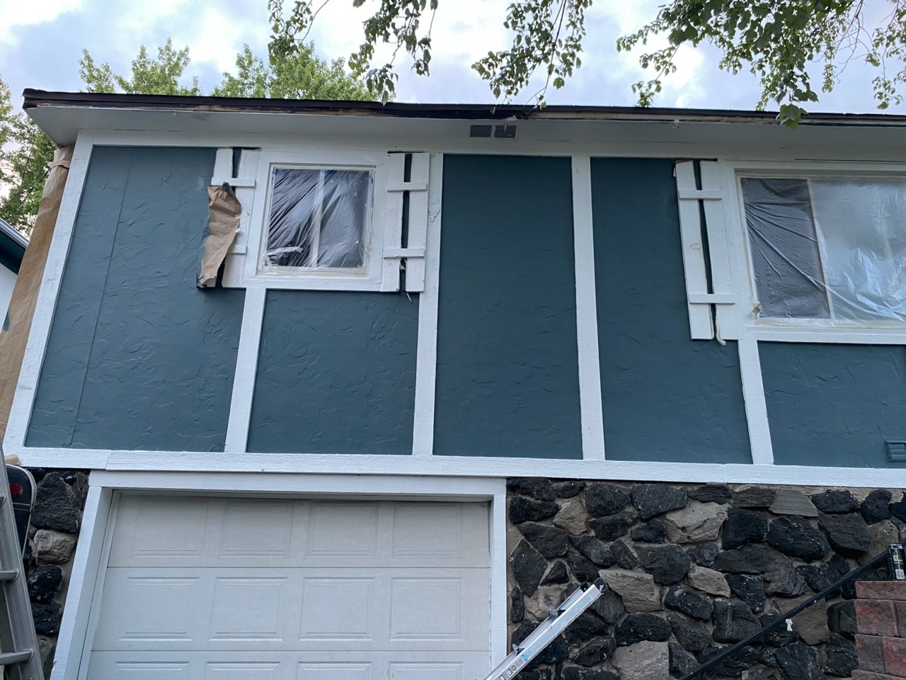 Exterior Siding — Fresh Teal Paint with Board & Batten Detail