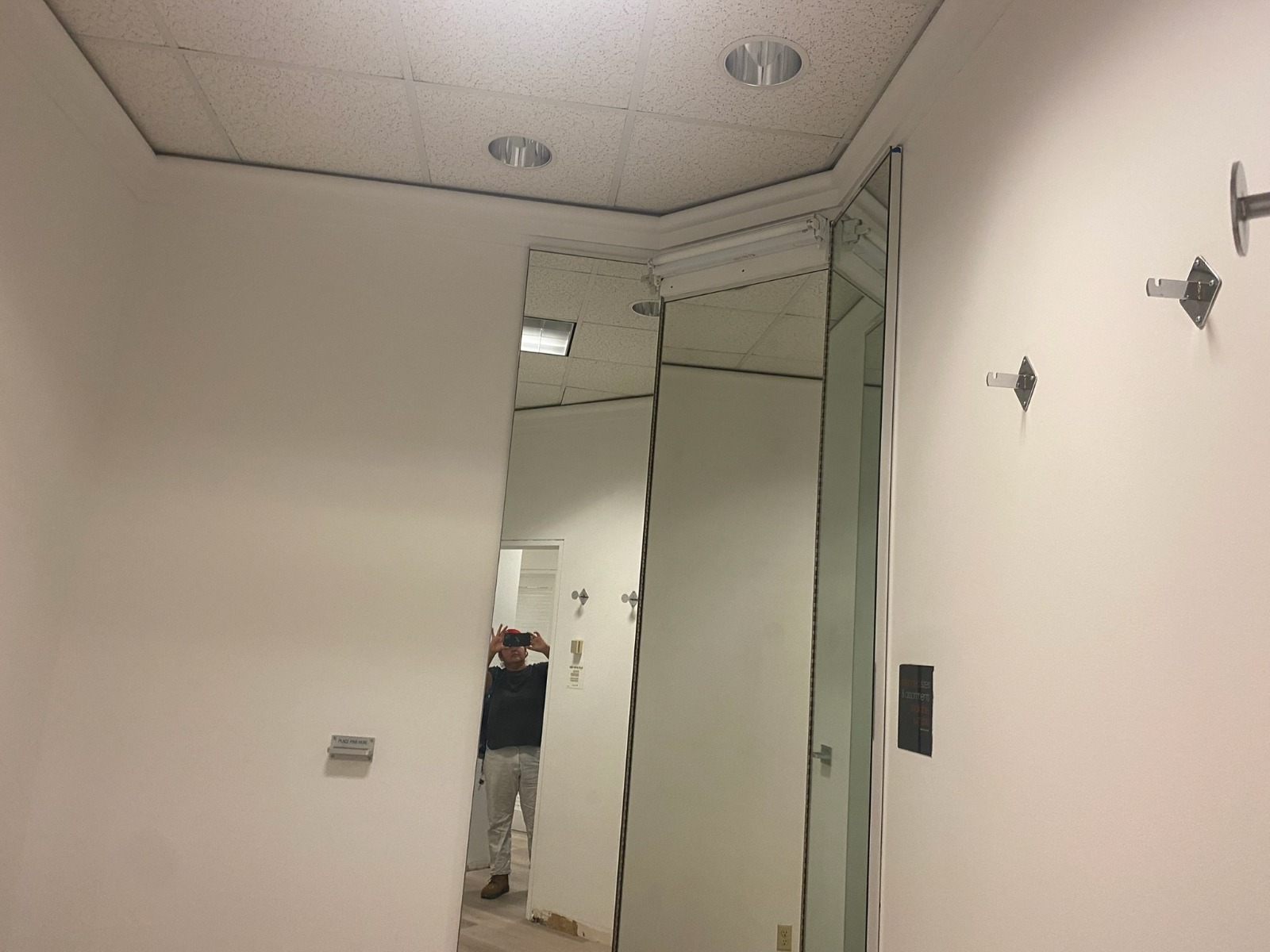Hallway Transformation — Clean White Finish with Mirrored Closet Doors
