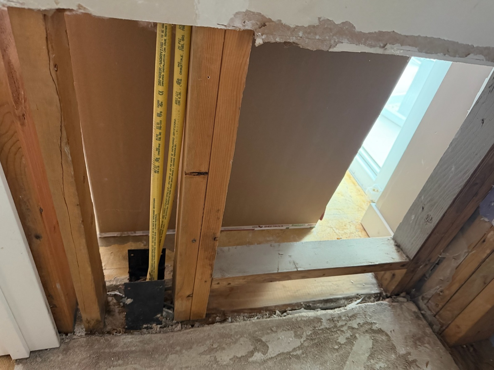 Wall Demolition — Exposed Studs & Electrical Rough-In Phase