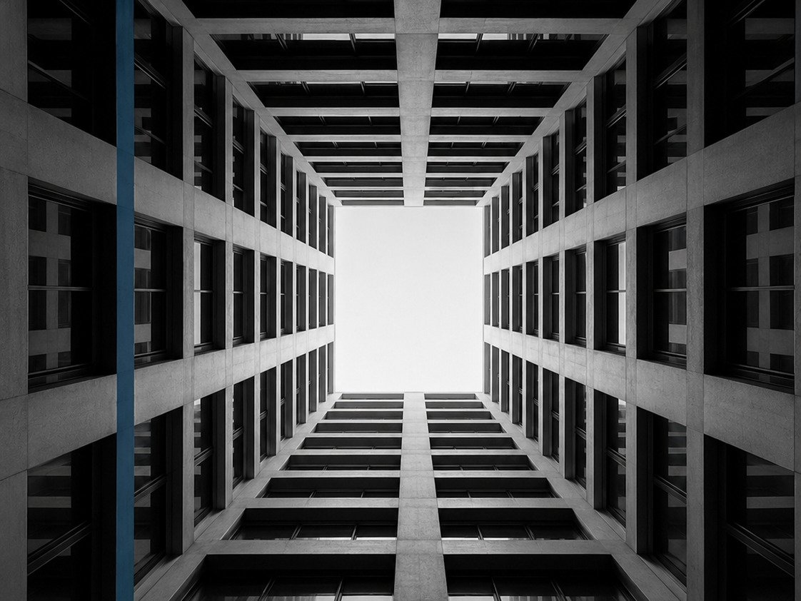 Open atrium representing clarity and space in technology decision-making