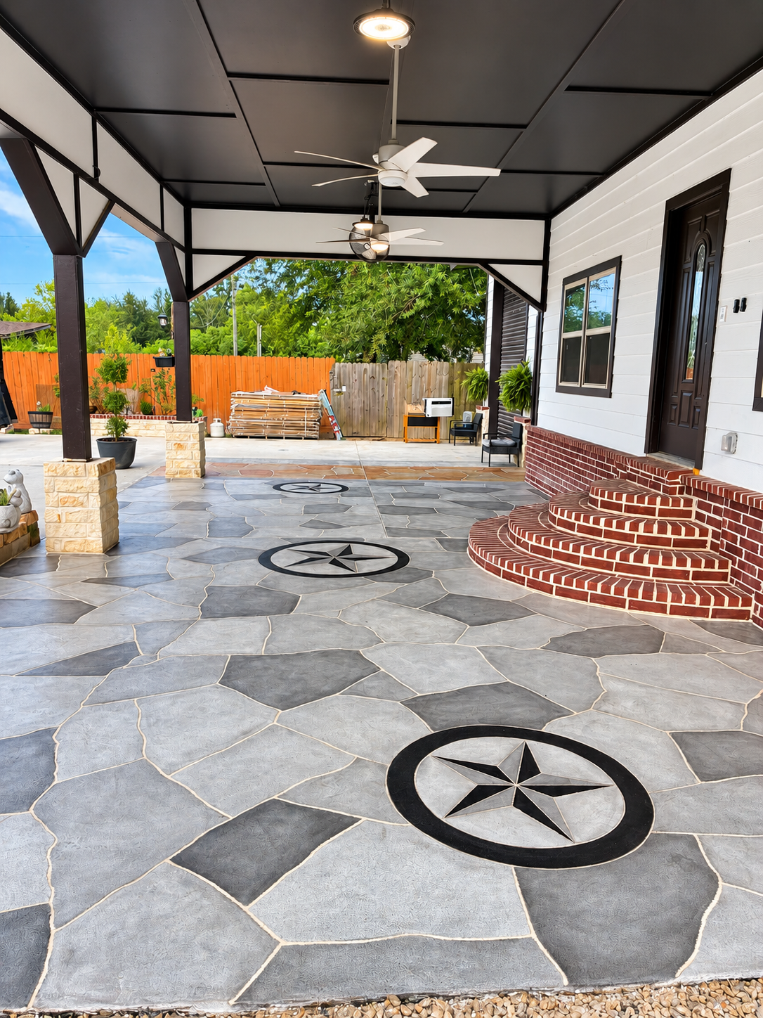 Backyard outdoor flooring with seating and kitchen area