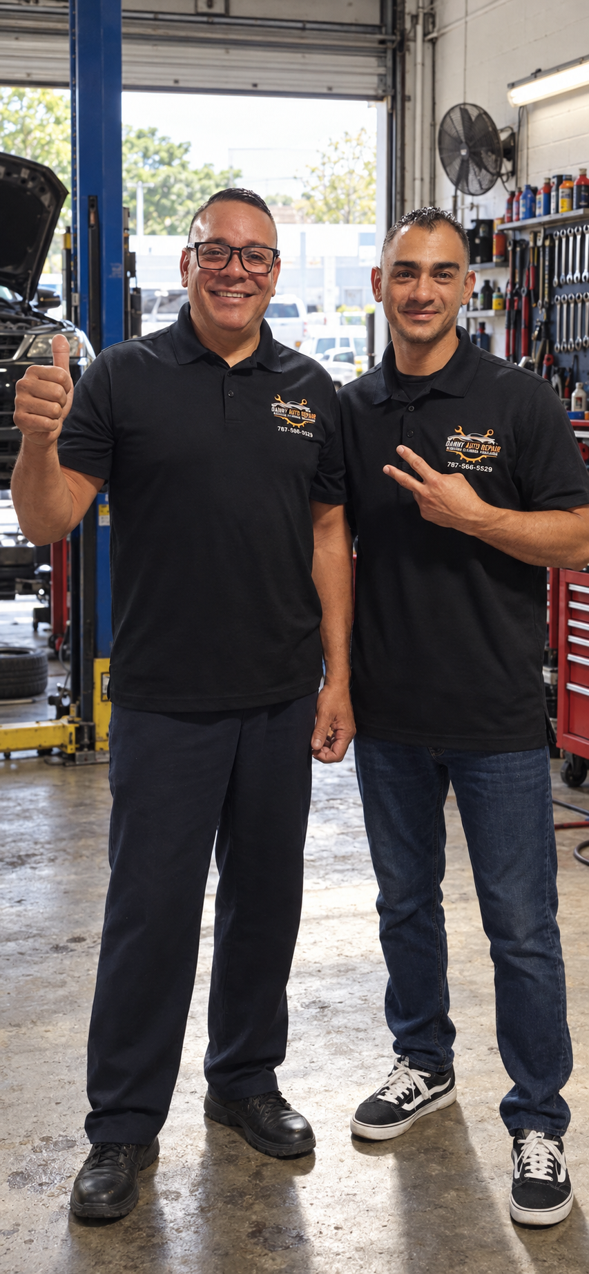 Danny, owner of Danny Auto Repair, pictured on the left beside a colleague.