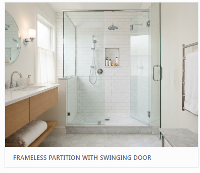 Frameless partition with swinging shower door in modern white bathroom