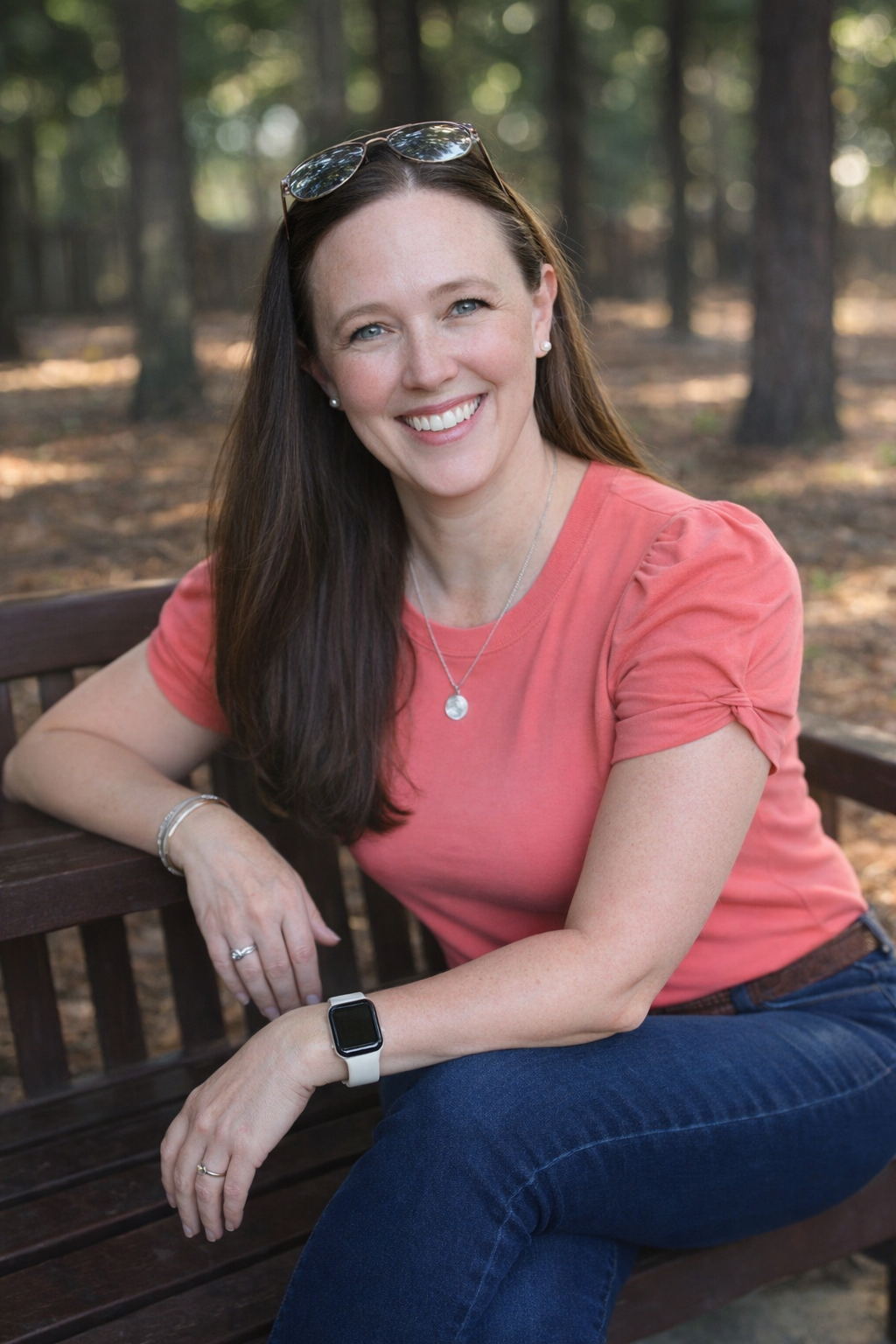 Jan Cates, founder of Blue Bamboo Creative smiling in natural daylight